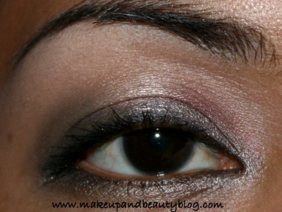 gold smokey eye makeup. The eyes are done…