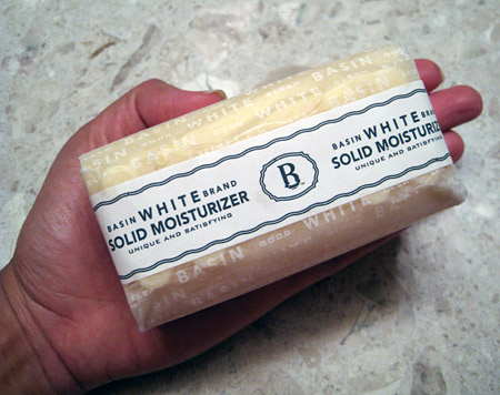 basin-white-solid-moisturizer-in-hand