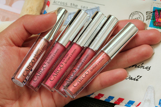 Cargo Voyages Gloss Collection in hand