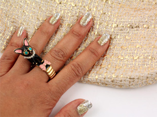 A silver and gold metal ombre manicure