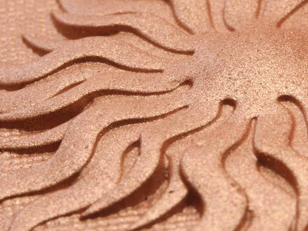 Physicians Formula's Bronze Booster Glow-Boosting Airbrushing Bronzing Veil big closeup
