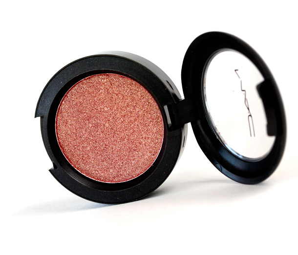 MAC Pink Pepper Pressed Pigment, a deep coral with golden pearl and a frost finish