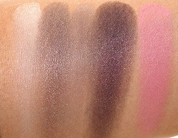 Tarte Gorgeous Getaways Swatches from the left: Eyeshadows in Serengeti Sand, Buckingham Palace, Rocky Mountains and Bordeaux; Blush in Ambitious