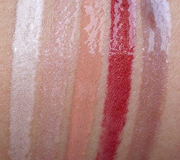 MAC Magnetic Nude Swatches, Lipglasses from the left: A Quiet Roar, Oh My Darling, Overspiced, Hell Bound and Steel Kiss