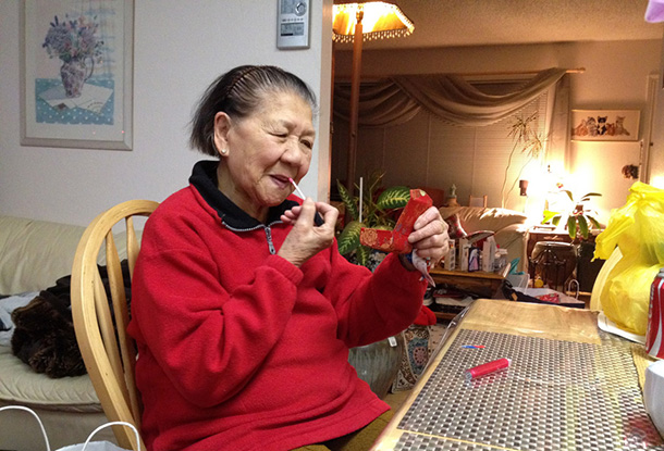 From two Christmases ago --- my granny touching up her red lipgloss!