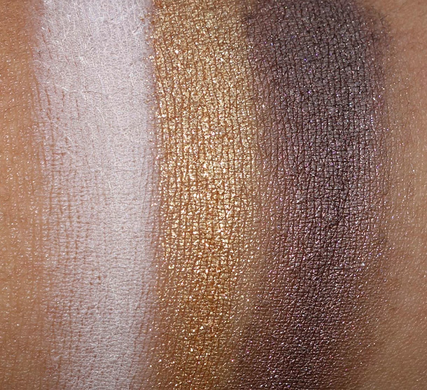 Too Faced Rock N Roll Palette Swatches from the left: Rockabilly (a sheer matte beige), Rap (a metallic golden bronze) and Ska (a shimmery dark brown)