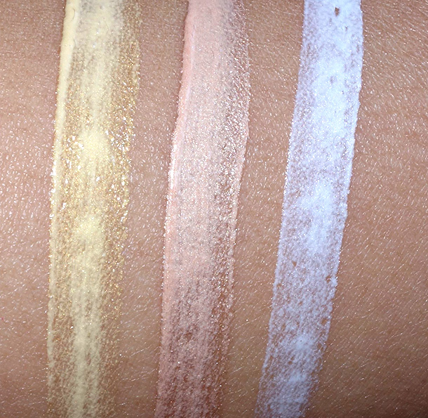 BECCA Shimmering Skin Perfector Spotlight Kit swatches from the left: Champagne Gold, Opal and Pearl