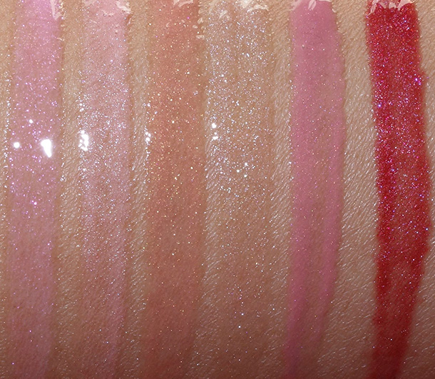 Buxom Lip Gloss Roulette swatches from the left: Full On Lip Polishes in Karen (confetti pink), Katie (pink lemonade), Megan (caramel dream), Rebecca (golden glitz), Sophia (sweetheart pink) and Zoe (dazzling orchid)