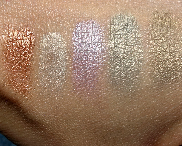 Laura Mercier Fairy Dust Eye Shimmer Swatches from the left: Crushed Copper, Crushed Platinum, Crushed Amethyst, Crushed Lapis and Crushed Opnyx