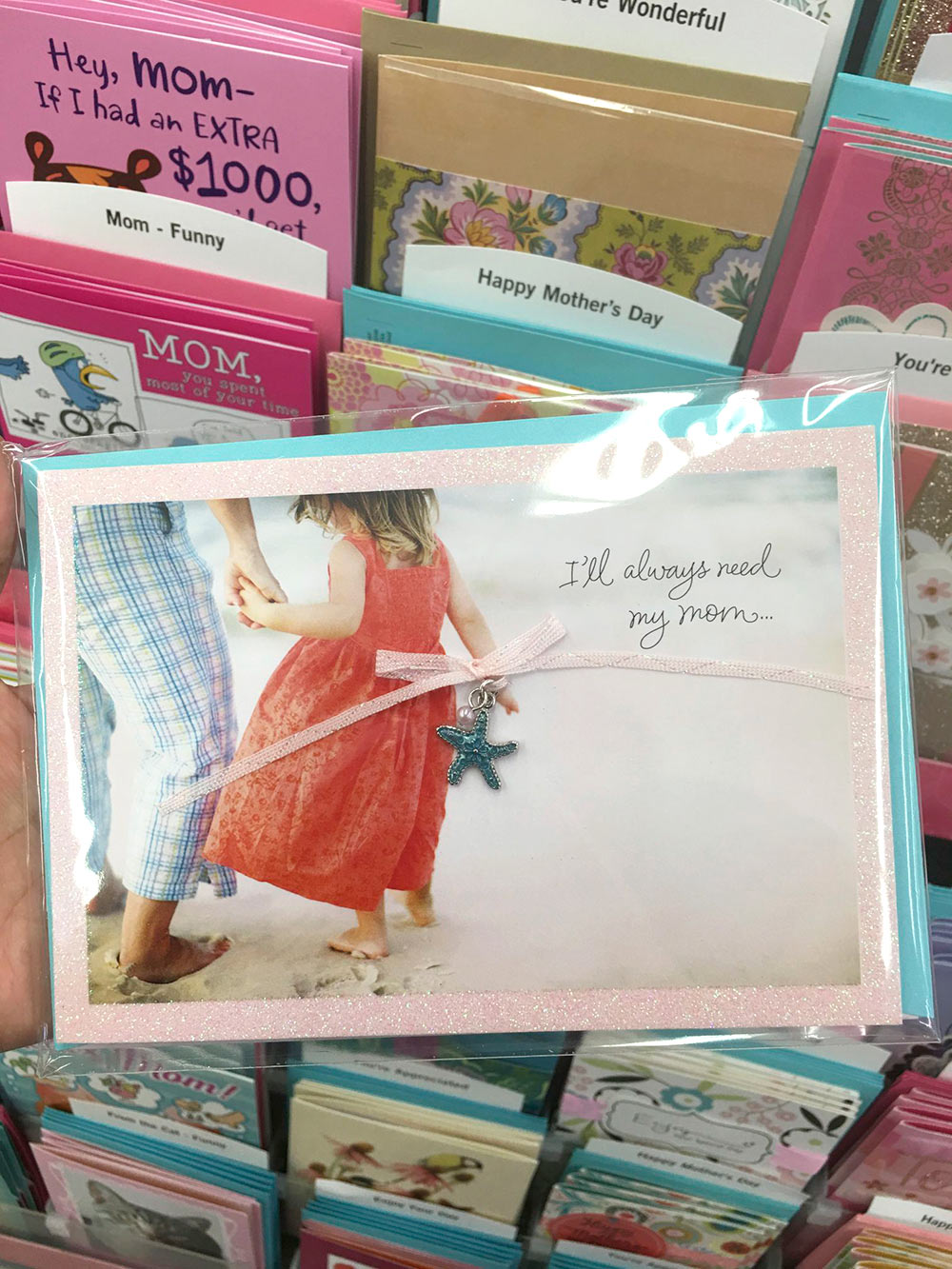So sweet! This card has a keepsake necklace.