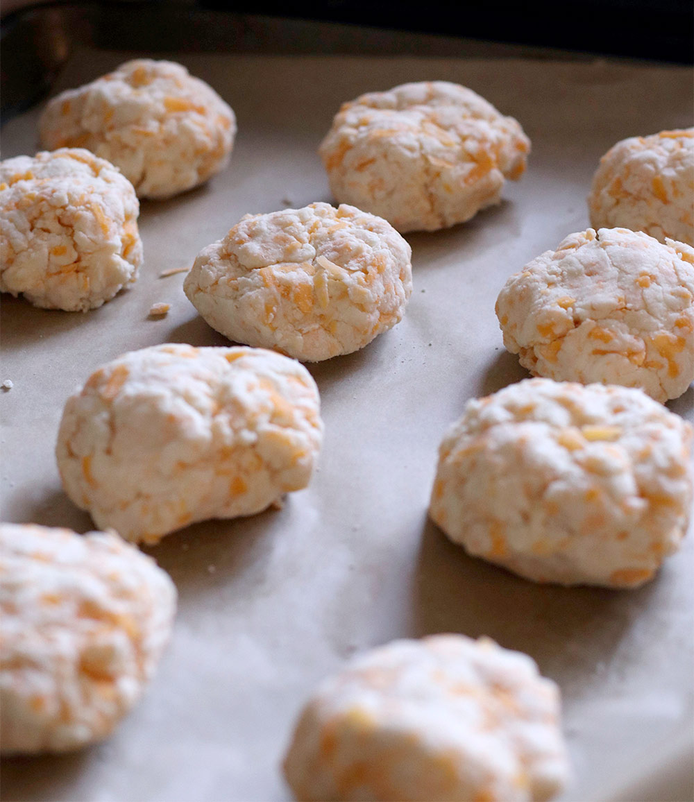 gluten free cheddar garlic biscuit recipe biscuits on baking sheet